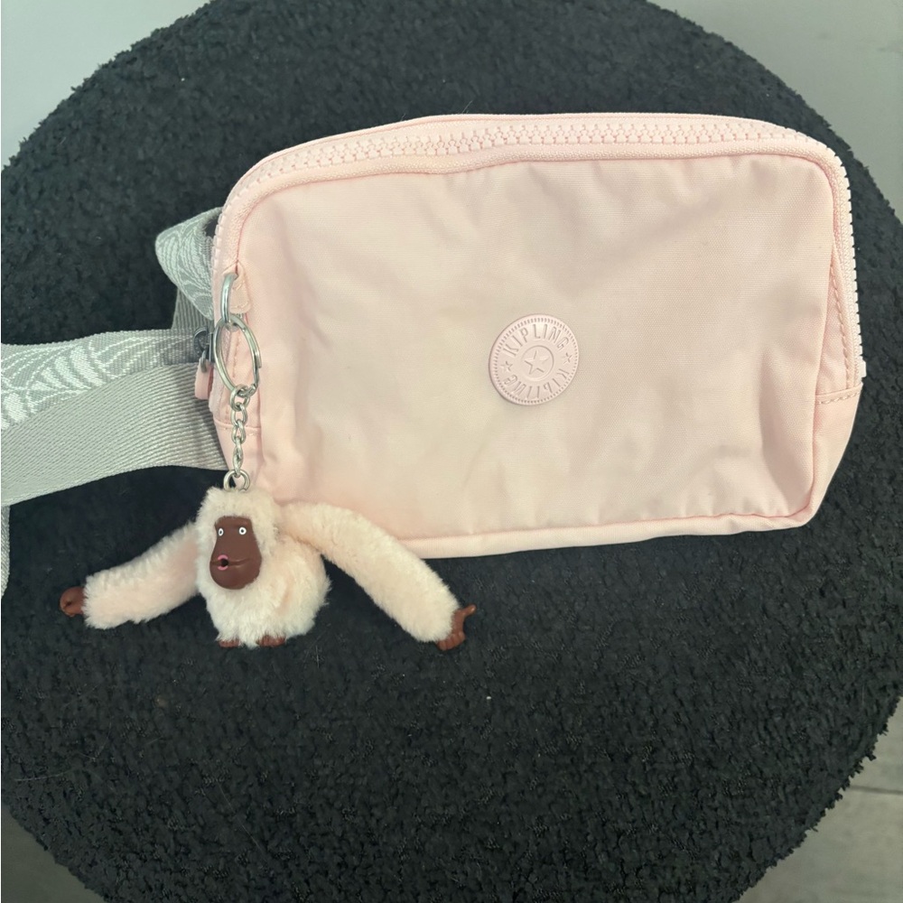 Kipling Light Pink Belt Bag with Monkey Charm